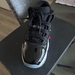 Air Jordan 11 Low Black Patent Leather Sneaker