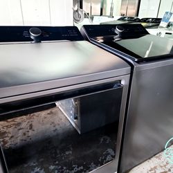 LG 5.5 Cu. Ft. Top Load Washer and 7.3 Cu. Ft. Electric Dryer with AI Sensing in Matte Black