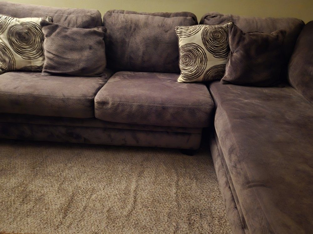 Sectional With Pillows  Plus Large Ottoman 