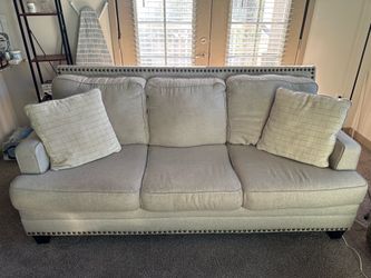 Light Gray Fabric Sofa with Nailhead Trim