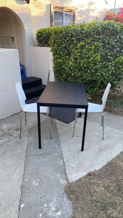 Three pieces Dining set two comfortable chairs and table good condition beautiful style and color space saver size Table L43.5” H29.5” W36.5”