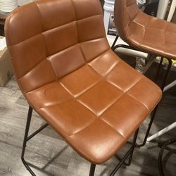 2 Brown Leather Bar Stools – Like New   Very clean, no rips/tears/stains, from smoke-free home   Counter height (seat about 24-26")   Super comfy, stu