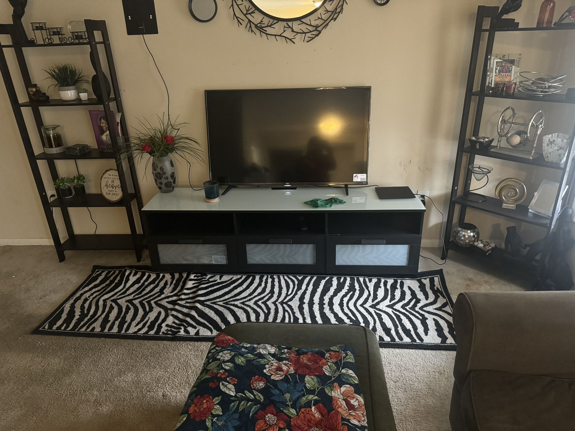 A Tv Stand That Will Fit Up To A 75 Inch Tv