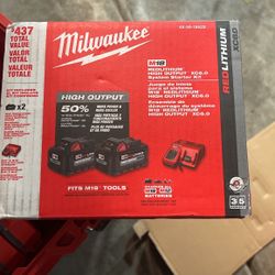 Milwaukee XC 6.0. Two Batteries And Charger