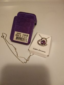 New Floating heart pendant w/purple cz