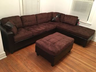 Brand new chocolate brown sectional and ottoman. Reversible chaise
