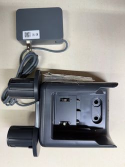 Samsung wall holder docking station with battery charger.