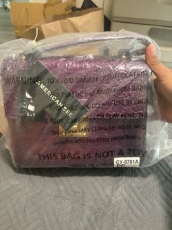 Purple snake skin purse