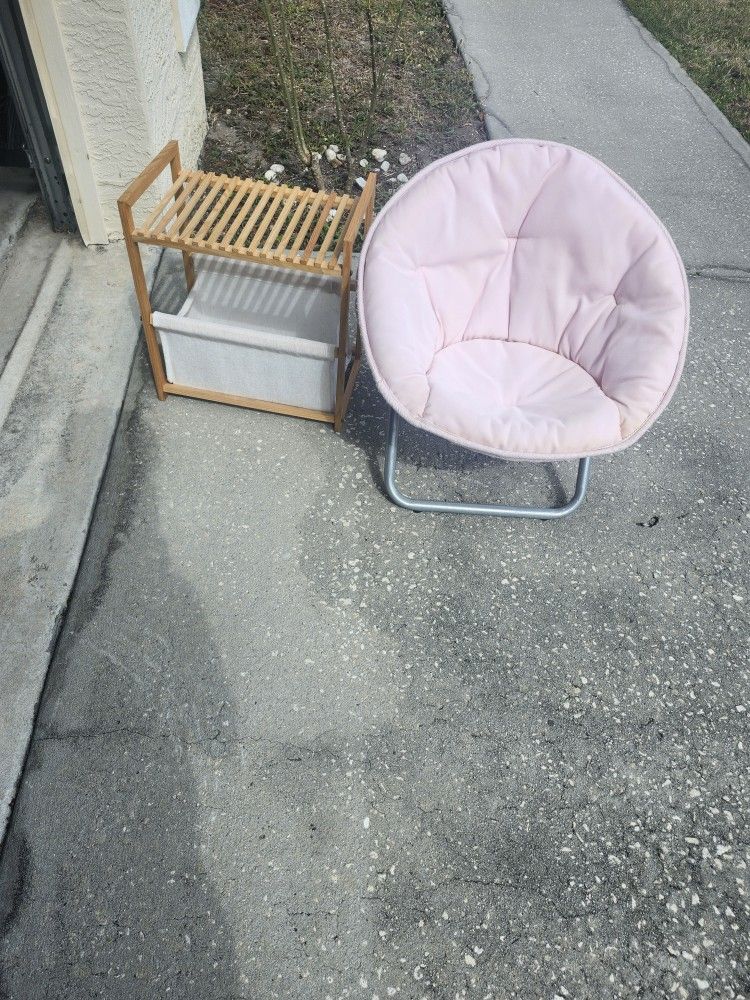 chair for small dog and basket of toys.