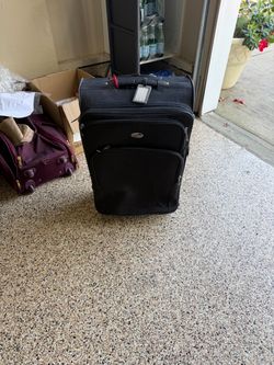 American Tourister Black Rolling Carry-On Luggage