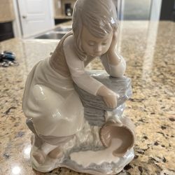 Lladro Figurine: “Don’t Cry Over Spilled Milk”