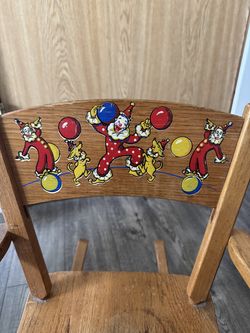 Vintage child size rocking chair with clowns
