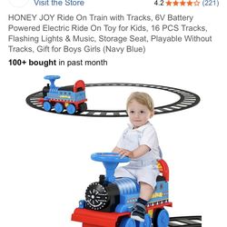 Blue Ride On Train With Track