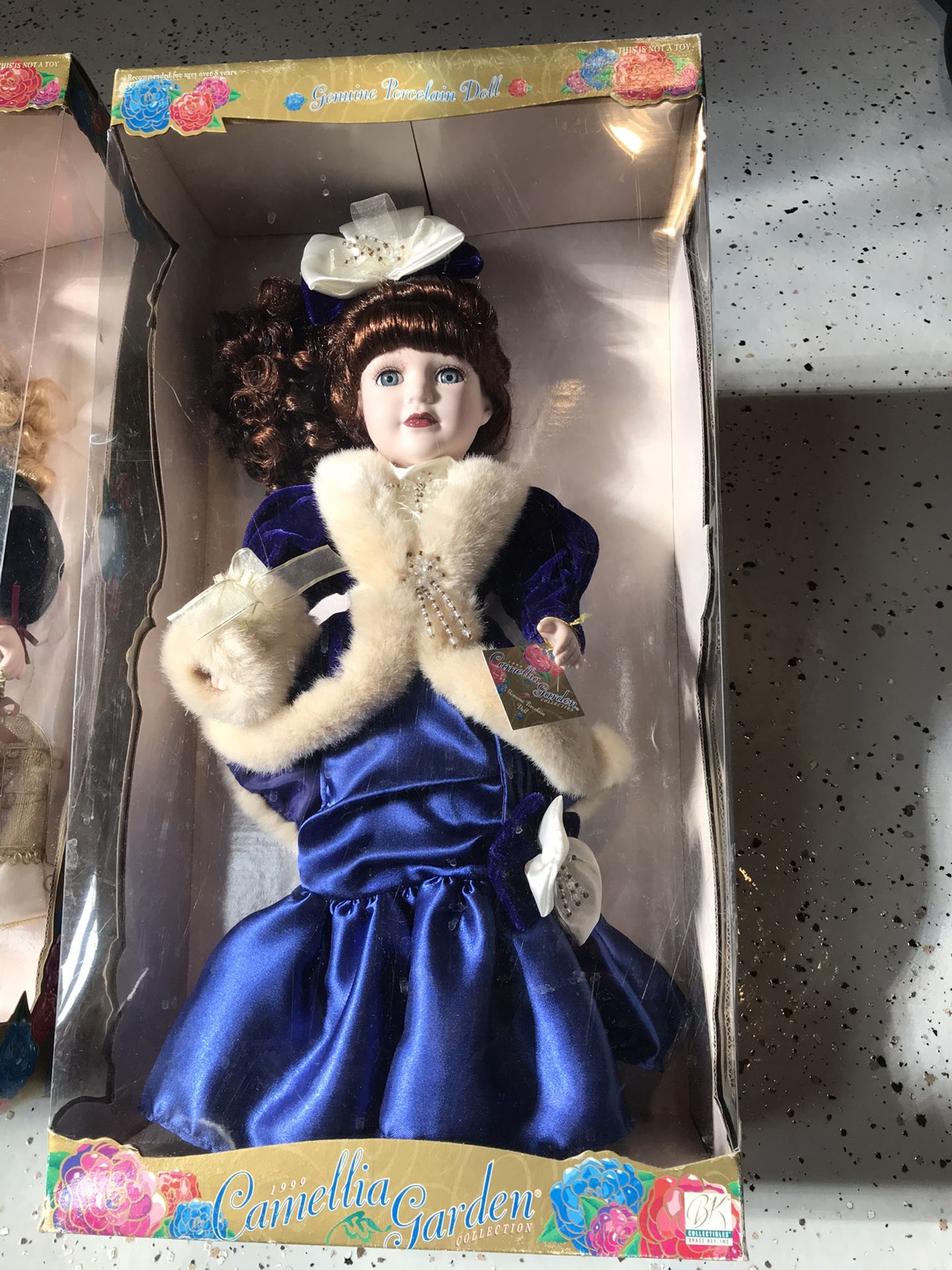 Porcelain doll new never opened the box