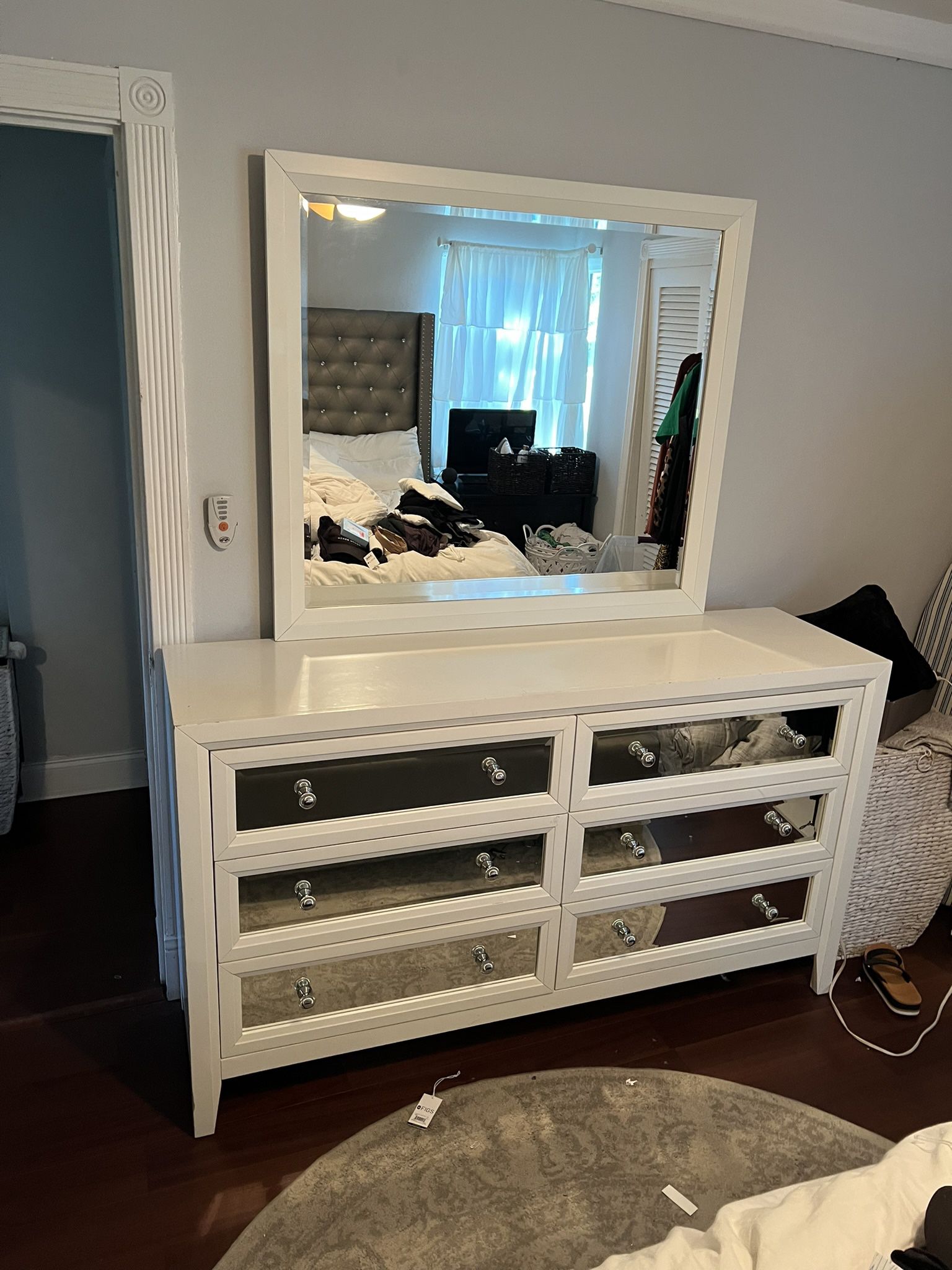 Dresser drawer with mirror finish and vanity mirror