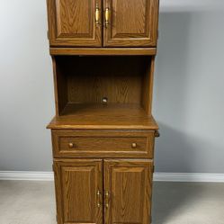 Wooden Kitchen Cabinet with hand towel holder on side of cabinet