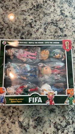 FIFA World Cup Mascot Action Figure Sets one includes  Messi, Ronaldo and Mbappe