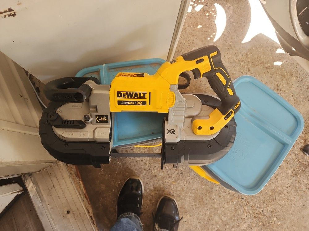 Dewalt Band Saw Never Used Was Bought as a Gift about a Year ago & Aready Had 2 