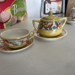 Japanese teacup, saucer, sugar bowl and saucer set