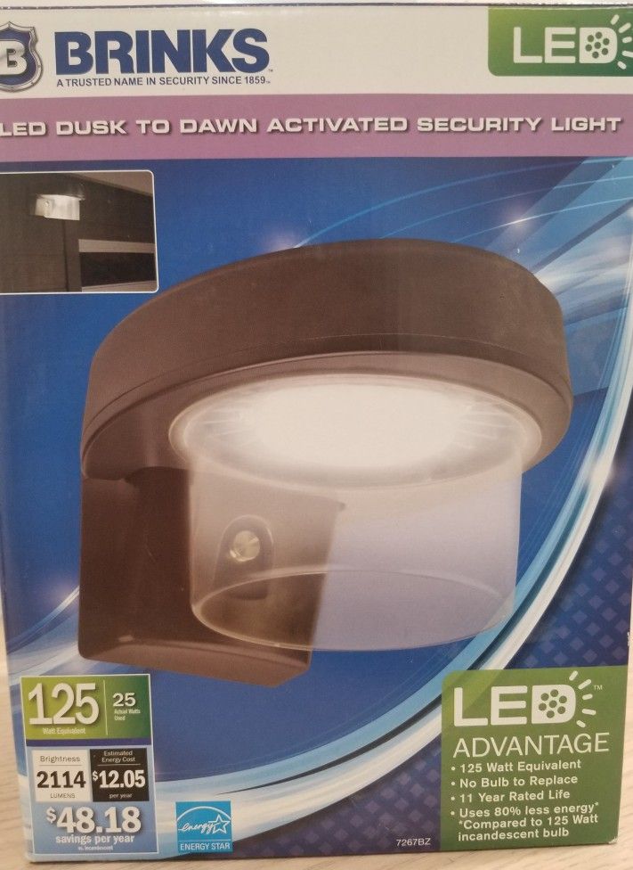 BRINKS LED DUSK TO DAWN ACTIVATED SECURITY LIGHT NEW IN BOX, BRONZE COLOR