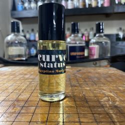 Curve Status  Body Oil 1.OZ roll On