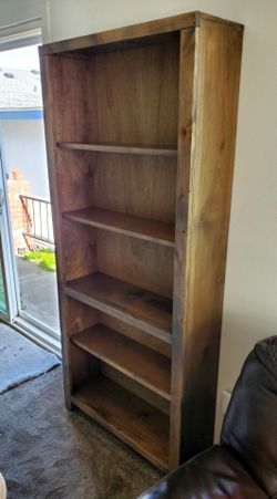 bookshelf is the Joshua Creek 72" Bookcase manufactured by Legends Furniture. The specific model/SKU printed on your label is JC6672L.BNW (GDDT)