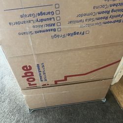 4 Wardrobe Boxes And Lots Of Large Moving Boxes 