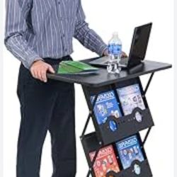 This is a black, foldable literature display rack with a tabletop. 