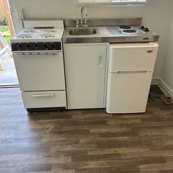 Electric Kitchenette With Sink/Stove/Fridge With Freezer Also A Gas Stove With Oven