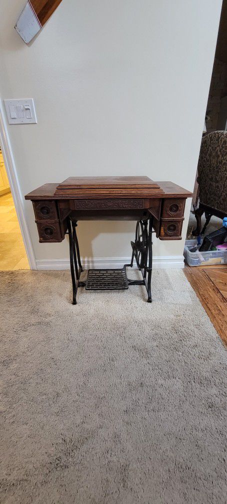 Antique Sewing Machine And Cabinet