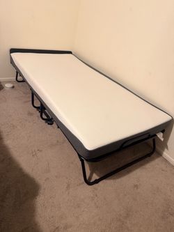 Brand new twin size folding bed