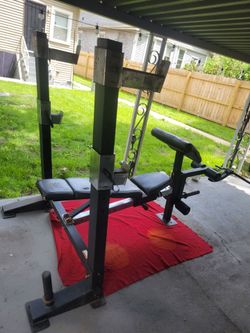 GOLD'S GYM OLYMPIC BENCH WITH SQUAT RACK  HEAVY DUTY HAS. SOME TEARS AND RUST 
11525 S HALSTED/7111.S WESTERN 
65$  CASH ONLY AS