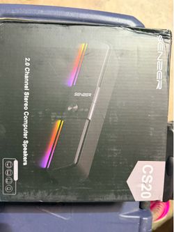 Versatile computer soundbar has dual 2.5-inch full-range drivers for clear sound. This black Senzer CS20 model features varied LED lighting modes incl