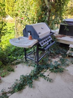 Lightly Used And Stored Outside Under A Roof Grill