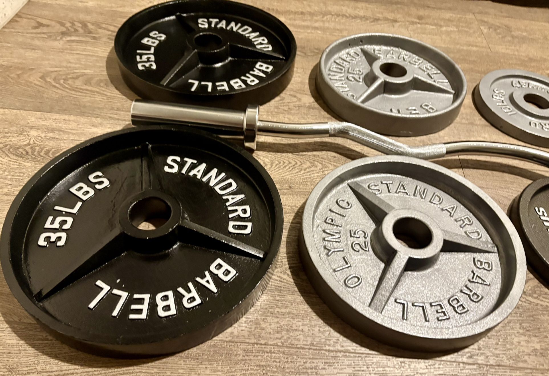 BRAND NEW Olympic Black Curl Bar With Reconditioned Cast Iron Weight Plates/ From 5s To 35s (Total: 175 lbs)