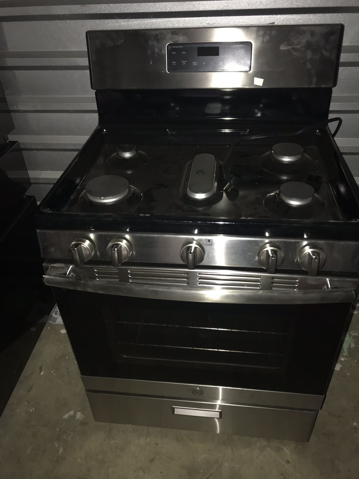 GE Stainless steel set Refrigerator, Stove, dishwasher and microwave