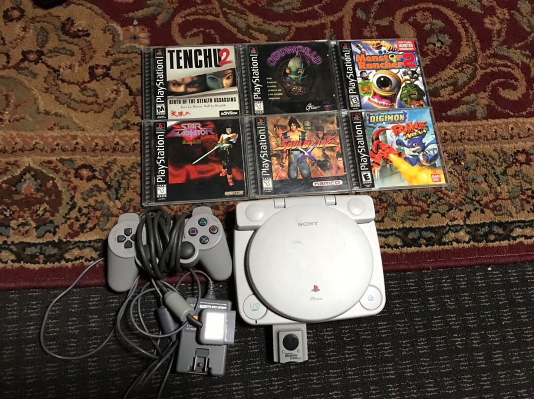 PlayStation one w/LCD screen + solid game titles