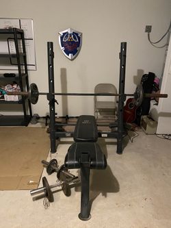 Olympic Bench, Rack, bar, weights, and dumbbells