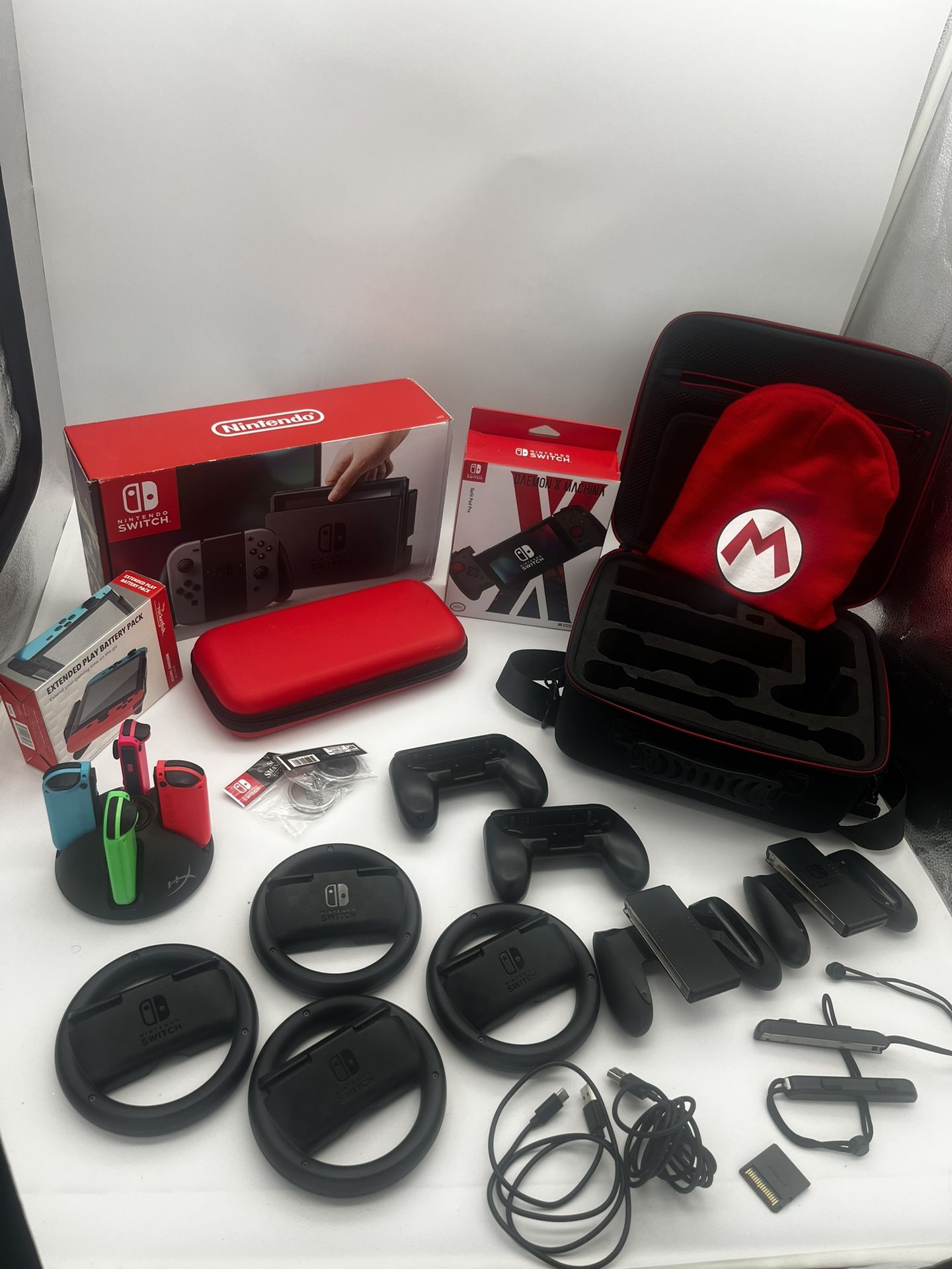 Nintendo Switch Bundle: Console, 4 Joy-Cons + Dock, HORI Split Pad Pro, Steering Wheels, Extra Cases