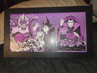Silver Buffalo Disney Villains Framed MDF Wall Art featuring Ursula, Maleficent, and the Evil Queen, set against a striking purple and black backgroun