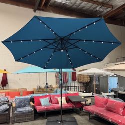 New in box 10' Cantilever Umbrella Offset Patio w/ Solar LED Lights and spot light (weights Sells Separately)