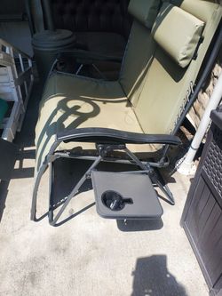 Recliner chair with little table on side