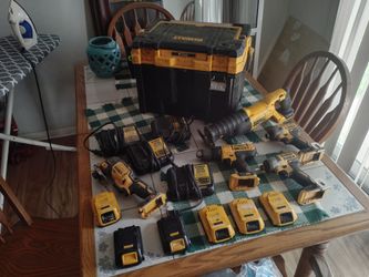 DeWalt cordless drills, impact wrenches,sawzall,6 batteries,4 chargers,and an oscillator,and stackable DeWalt box