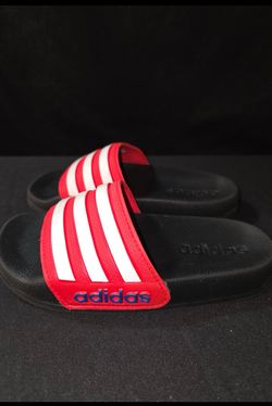 kids' Adidas Adilette Shower Slides in Core Black/Footwear White/Vivid Red.   Size 4  Used