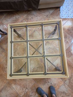 Table with glass frame
