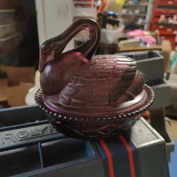 Westmoreland Amethyst Carnival Glass Swan on a Nest covered dish. 