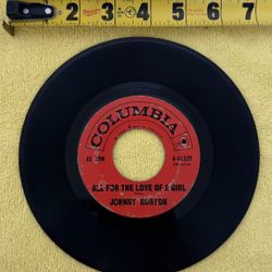 Columbia 45 RPM vinyl single by Johnny Horton featuring "The Battle of New Orleans" and "All for the Love of a Girl". 