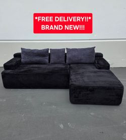 NEW BONELESS BLACK COUCH