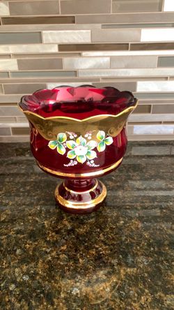 Vintage Bohemian cranberry glass pedestal bowl featuring ornate gold gilding and hand-painted raised white floral