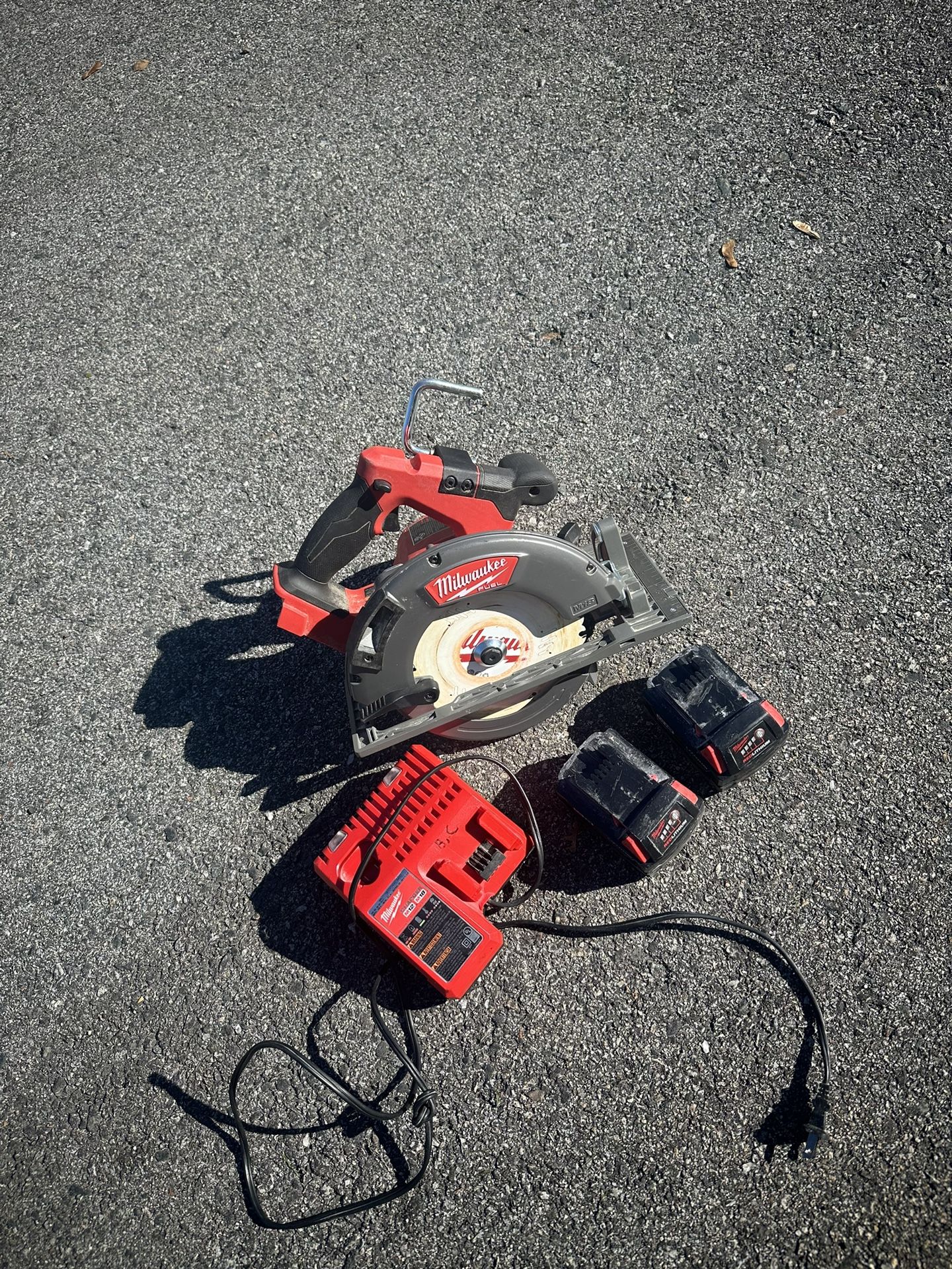 Milwaukee Skillsaw And Batteries  